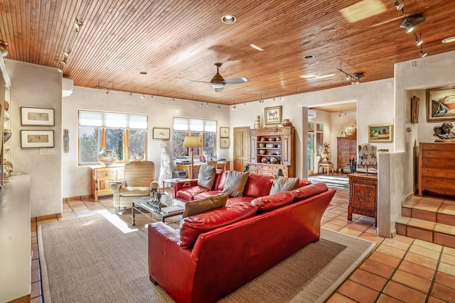 living room featuring wood ceiling, ceiling fan, rail lighting, and light tile patterned flooring