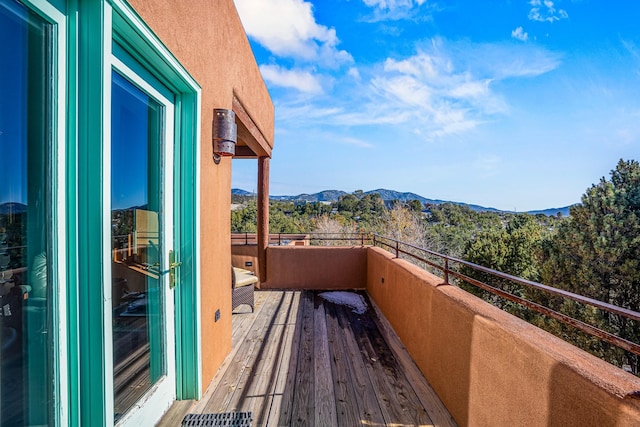 balcony featuring a mountain view