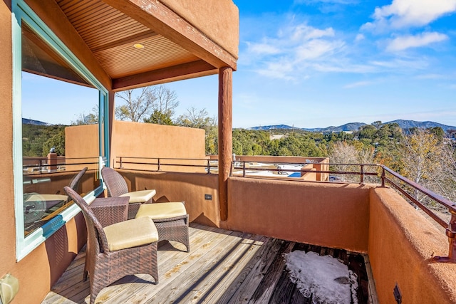 balcony featuring a mountain view