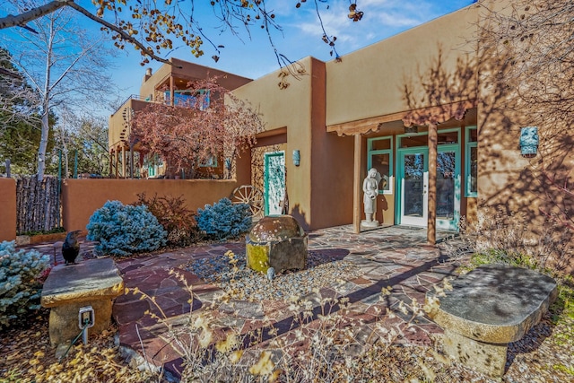 back of property featuring a patio area