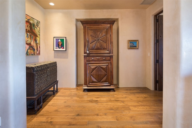 hall featuring light hardwood / wood-style flooring