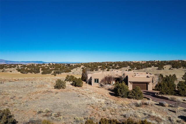 back of house featuring a mountain view