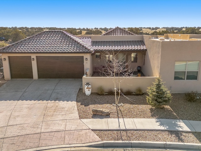 view of front of home with a garage