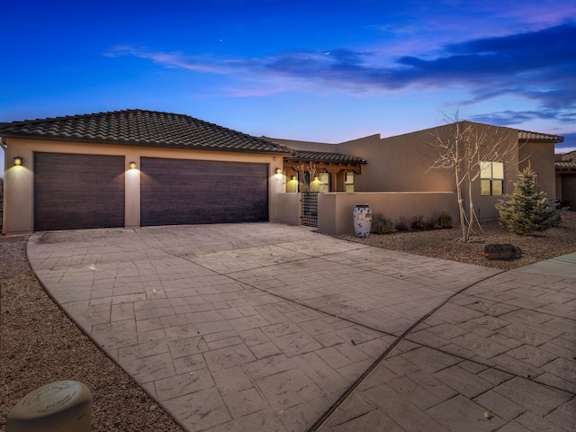 view of front of house with a garage