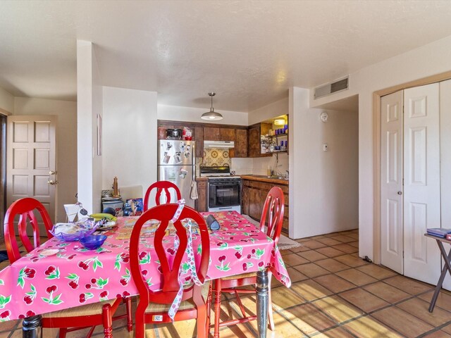 view of tiled dining area