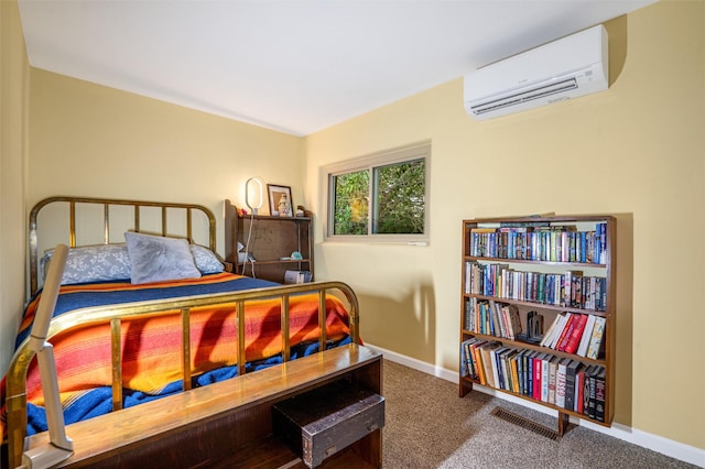 bedroom featuring carpet floors and a wall unit AC