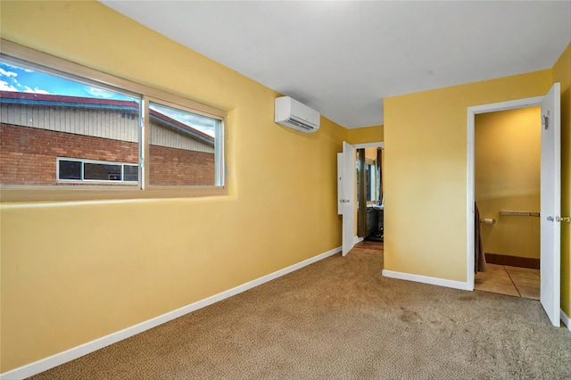 unfurnished bedroom featuring carpet floors and an AC wall unit