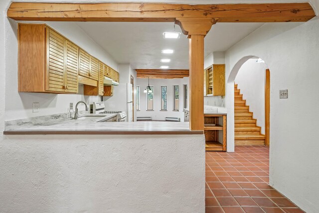 unfurnished sunroom with beamed ceiling, a baseboard radiator, and wooden ceiling