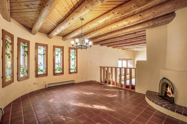 interior space featuring wood ceiling, baseboard heating, beam ceiling, a notable chandelier, and a brick fireplace