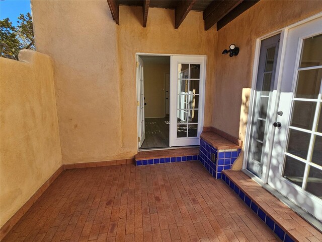 doorway to property with french doors and a patio area