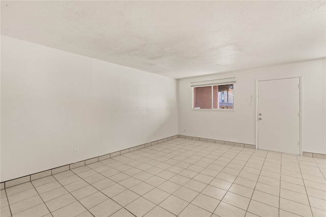 empty room with a textured ceiling