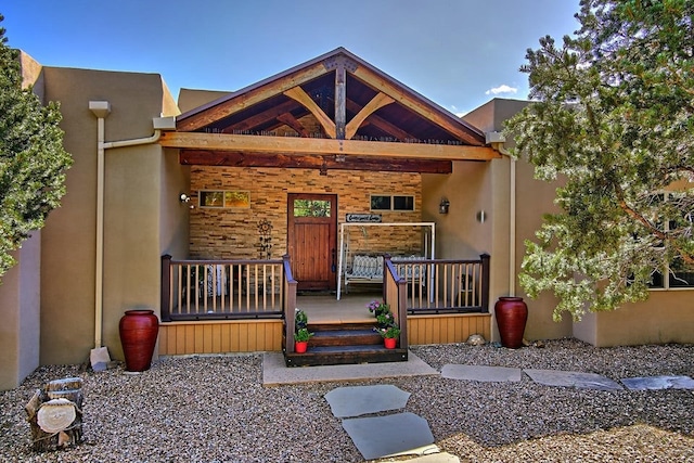 property entrance with a porch