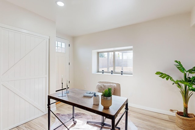 office featuring plenty of natural light and light wood-type flooring