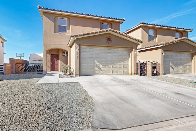 mediterranean / spanish-style home featuring a garage