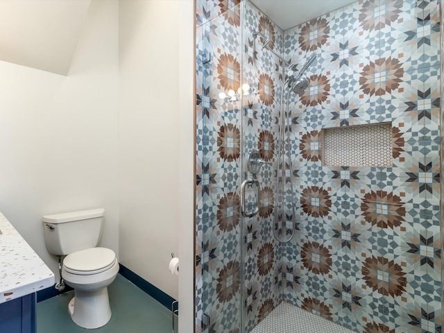 full bathroom featuring vanity, toilet, and a shower stall