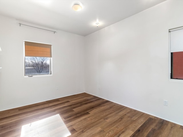 unfurnished room featuring wood finished floors