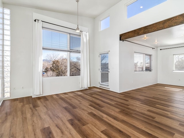 unfurnished dining area with wood finished floors