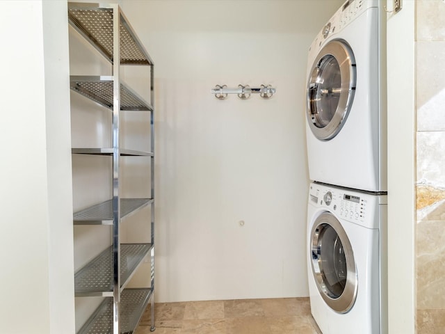 washroom with laundry area and stacked washing maching and dryer