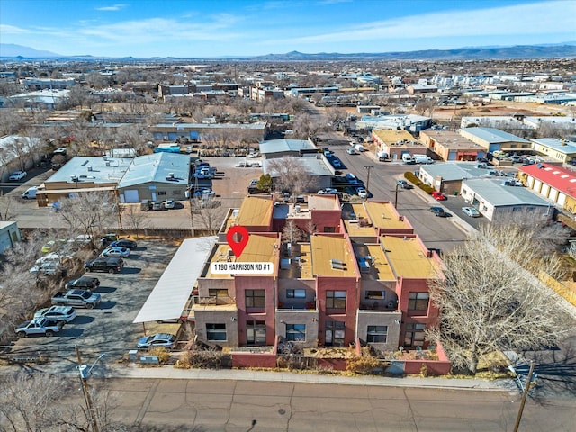 drone / aerial view featuring a mountain view