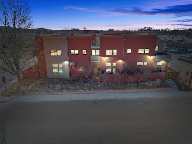 view of property at dusk