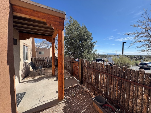 2210 Miguel Chavez Rd Unit 815, Santa Fe, NM 87505 - view of patio featuring a fenced backyard