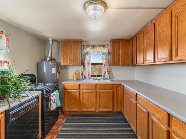 kitchen with sink, water heater, and black appliances