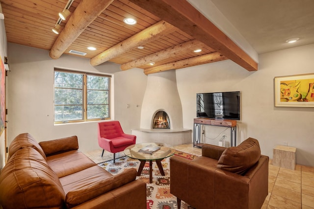 tiled living room featuring wood ceiling, a fireplace, and beamed ceiling