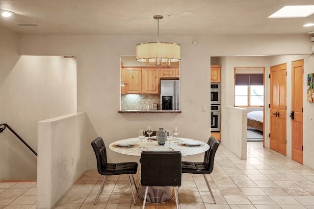 view of tiled dining area