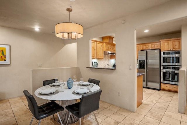 view of tiled dining room