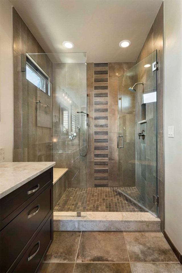 bathroom with a shower stall