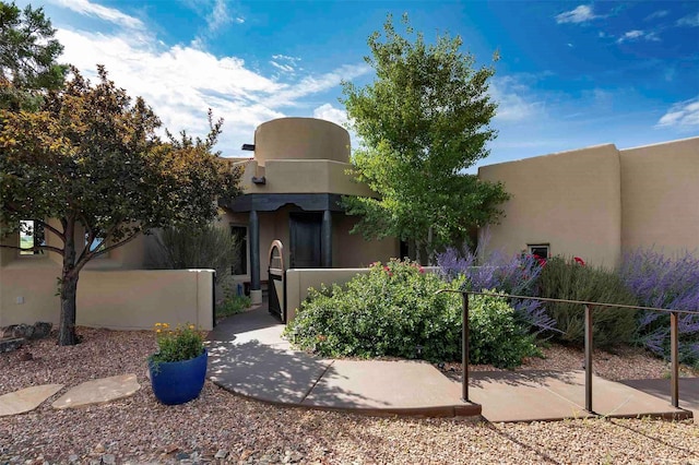 view of pueblo revival-style home