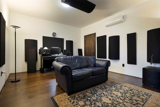 living room featuring a wall mounted AC and dark wood finished floors