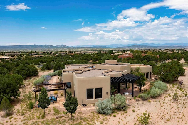 exterior space featuring a mountain view