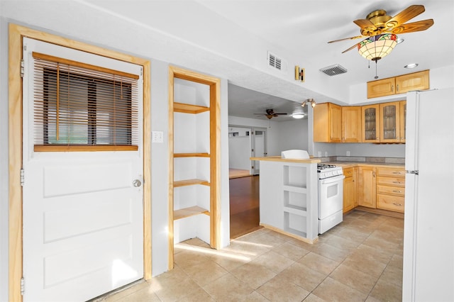 kitchen featuring light brown cabinetry, white appliances, kitchen peninsula, and ceiling fan