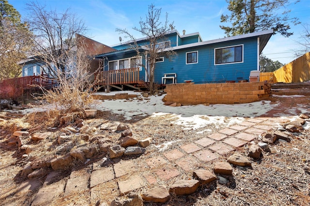 rear view of house with a deck