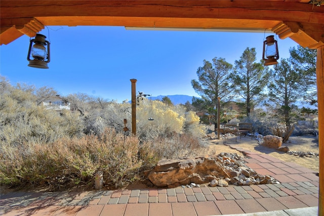 view of patio with a mountain view