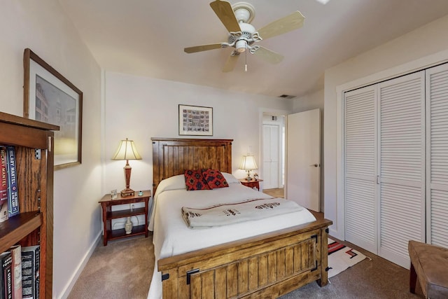 carpeted bedroom featuring ceiling fan and a closet