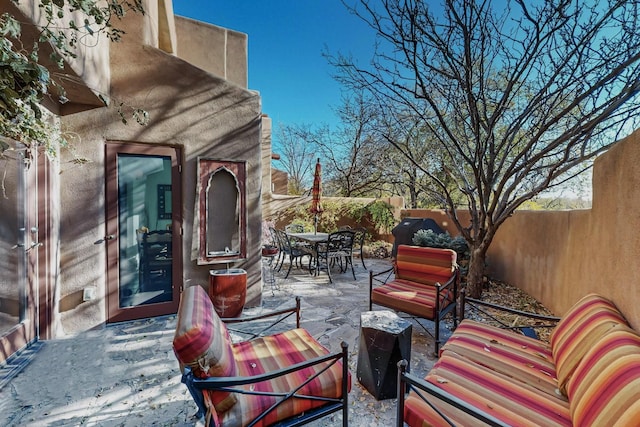 view of patio / terrace with a fireplace