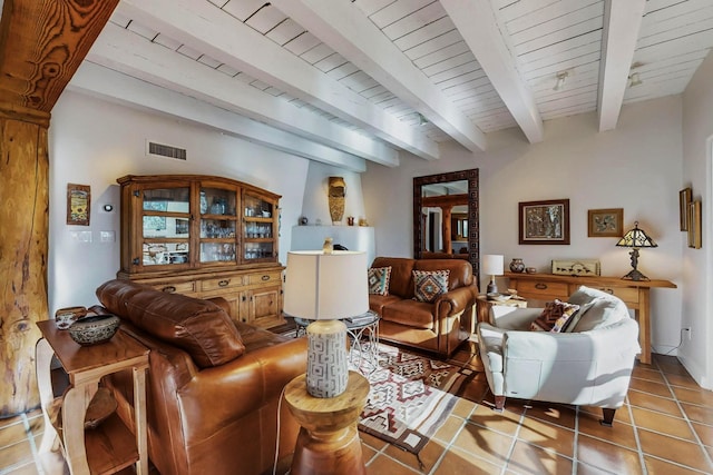 tiled living room featuring beamed ceiling and wooden ceiling