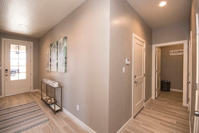 interior space featuring a textured ceiling