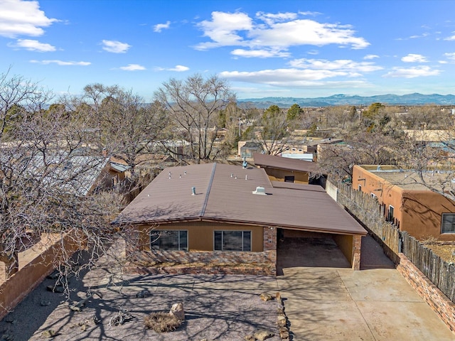 birds eye view of property with a mountain view