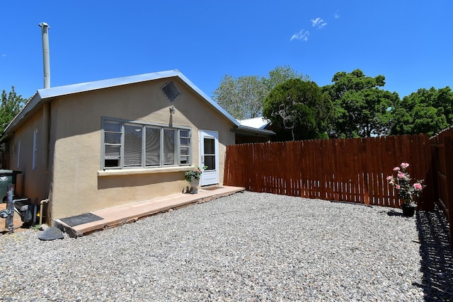 back of house featuring a patio