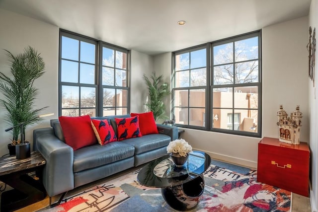 living room featuring a healthy amount of sunlight