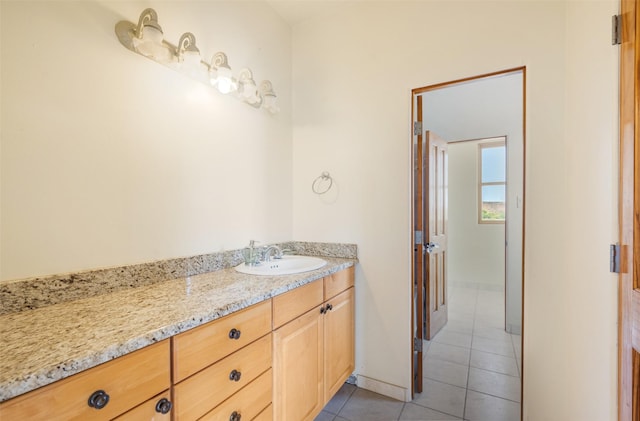 bathroom with vanity and tile patterned flooring