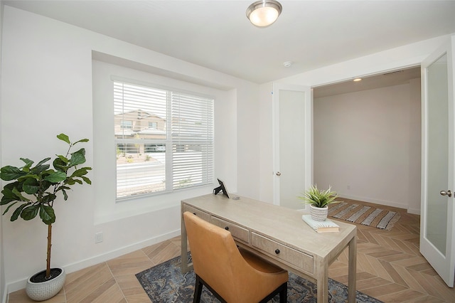 home office featuring light parquet floors