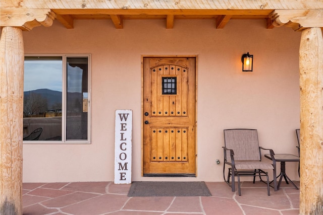 doorway to property featuring a mountain view