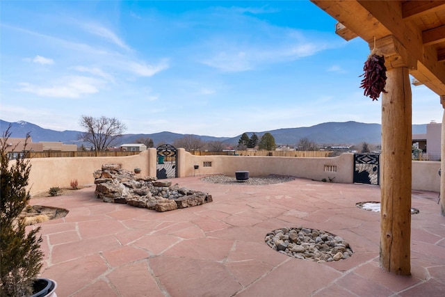 view of patio with a mountain view