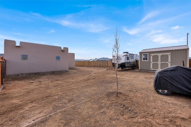 view of yard with a shed