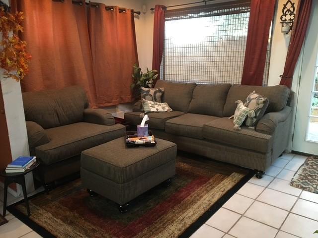 living room featuring light tile patterned floors