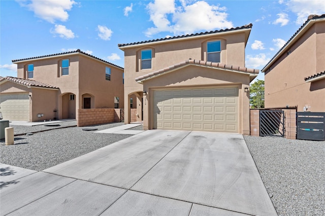 mediterranean / spanish-style house featuring a garage